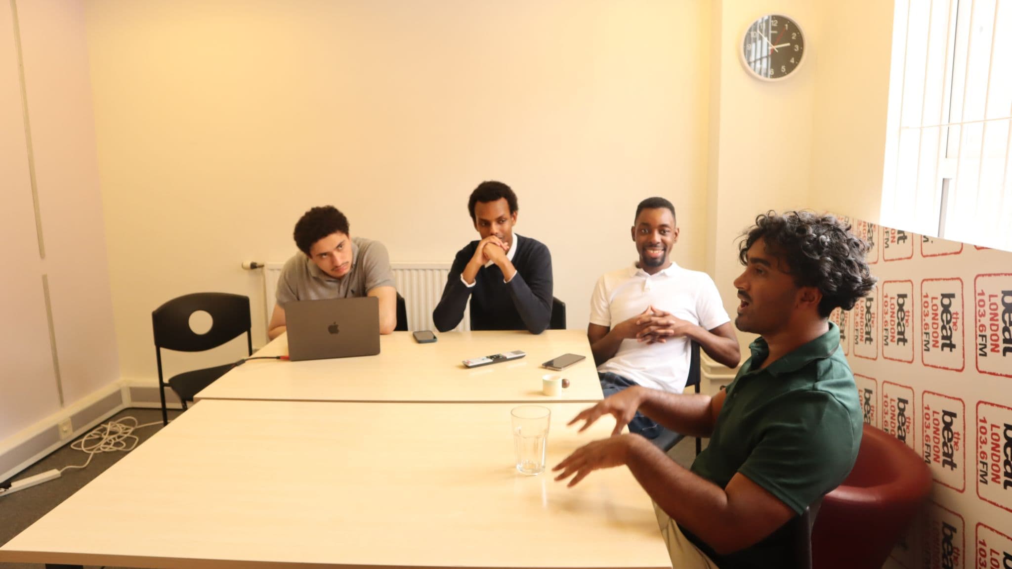 Jamil teaching a BANG student to code